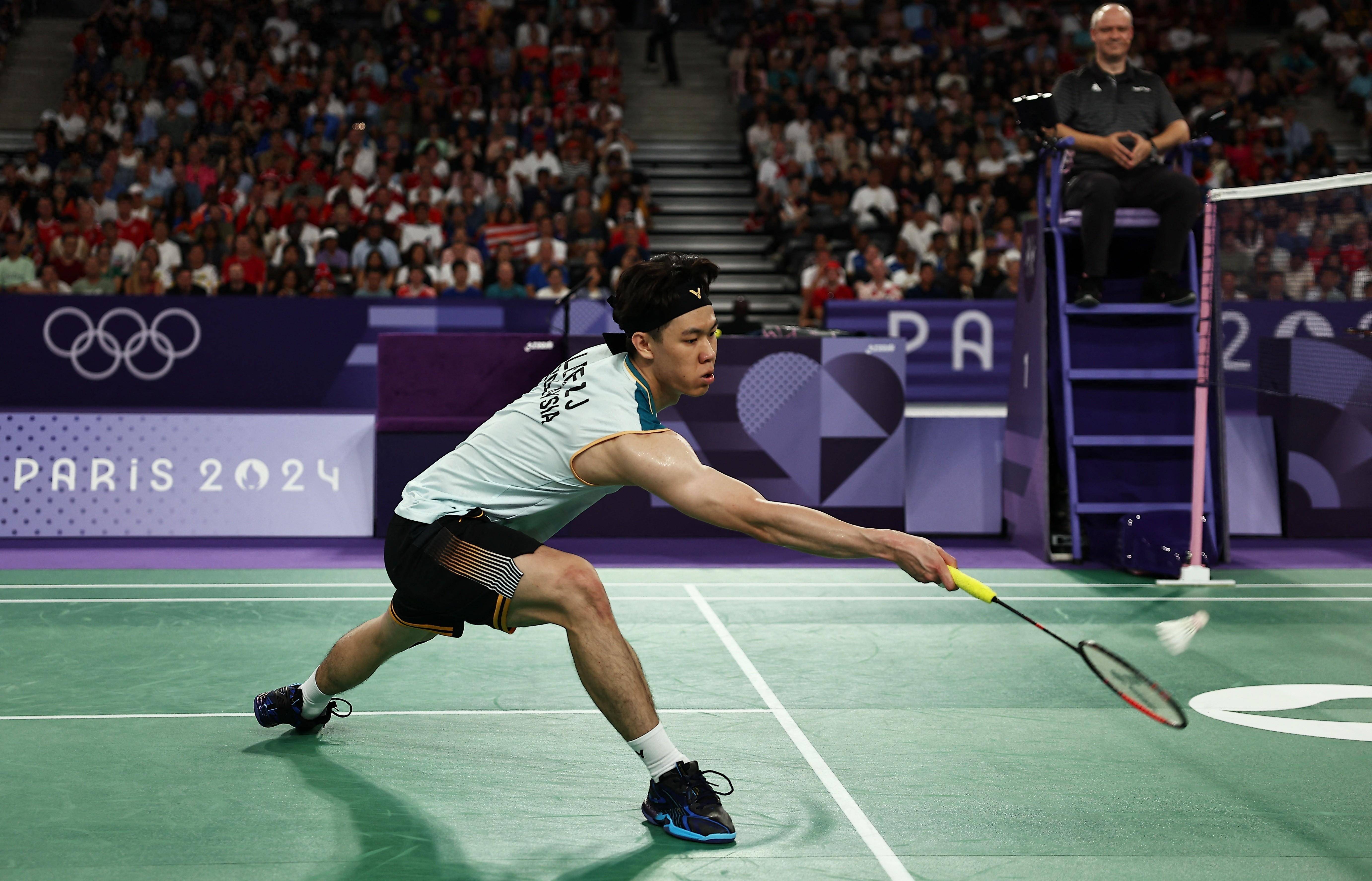 爱游戏2026-中国队轻取马来西亚队,李梓嘉带队取胜